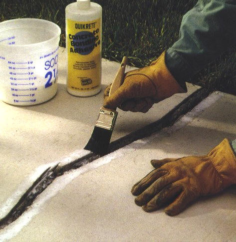 filling crack in concrete slab for repair