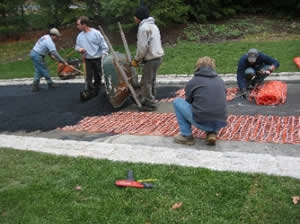 Mineral heating cable woven into fiberglass mesh